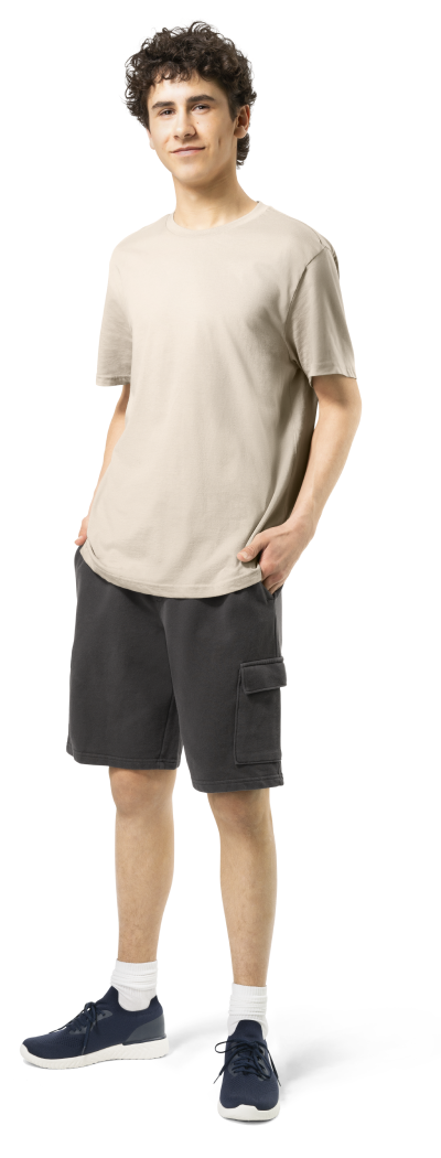 Picture of young man standing with hands in pockets