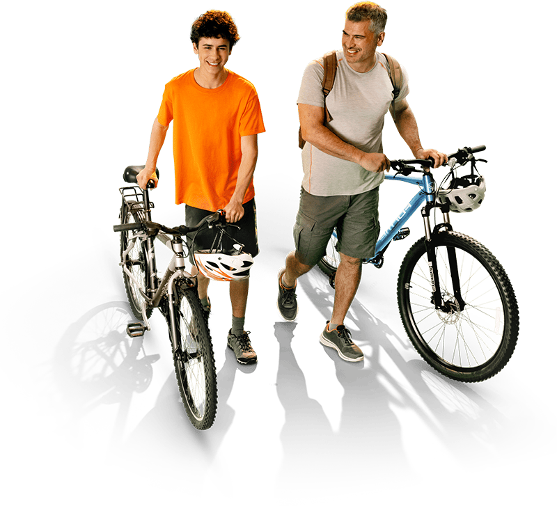 Picture of younger and older man walking with bicycles